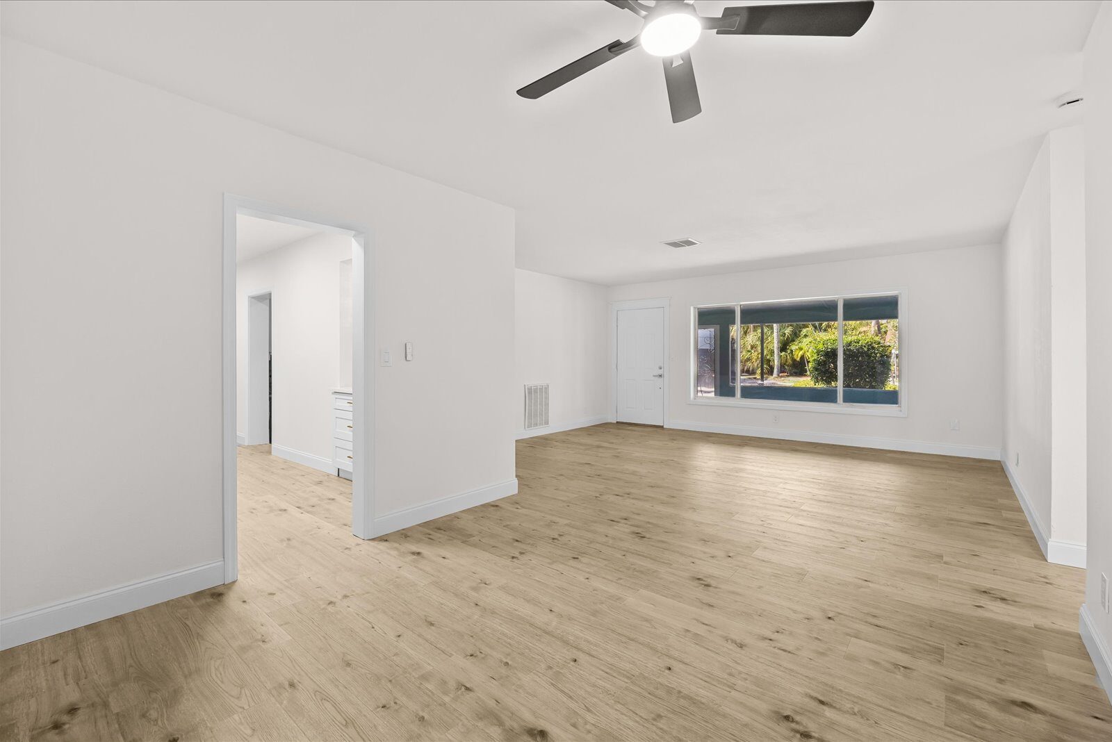 Dining and sunroom after renovation at 800 SE 13th Ct in Deerfield Beach Florida