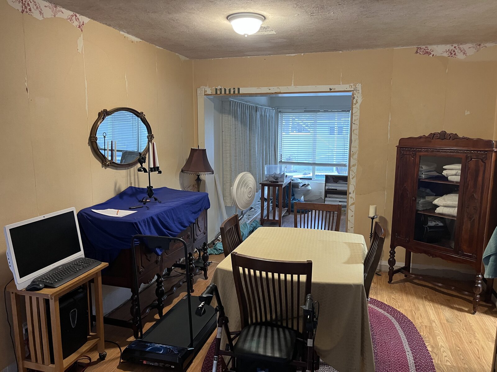 Dining and sunroom before renovation at 800 SE 13th Ct in Deerfield Beach Florida