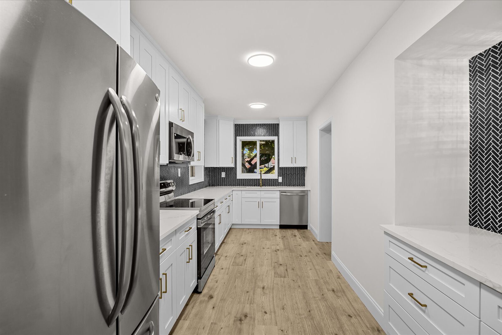 Kitchen after renovation at 800 SE 13th Ct in Deerfield Beach Florida