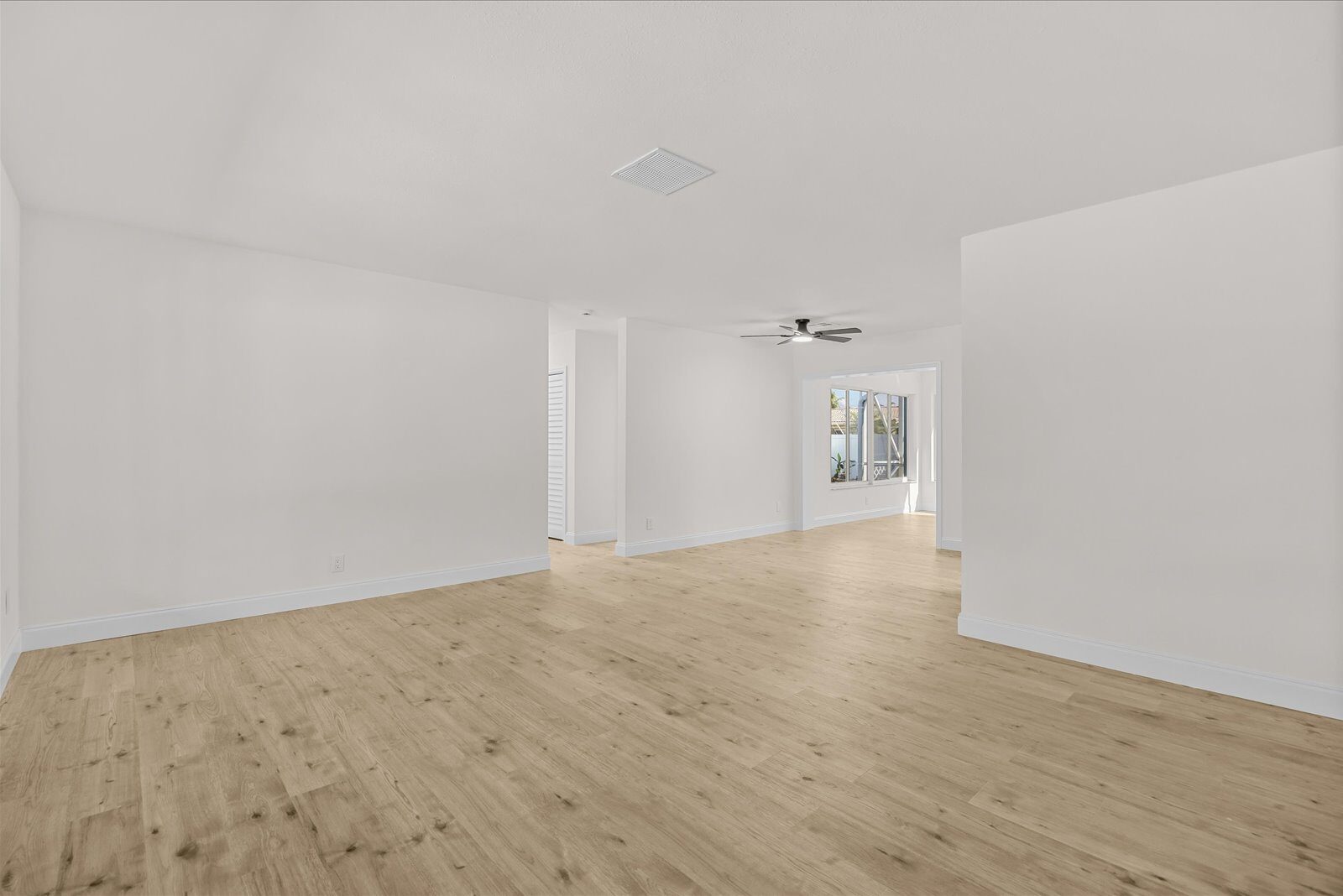 Living area after renovation at 800 SE 13th Ct in Deerfield Beach Florida